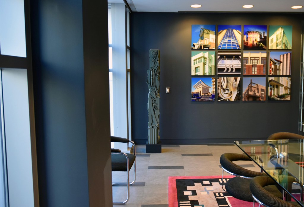 painted wooden sculpture in conference room