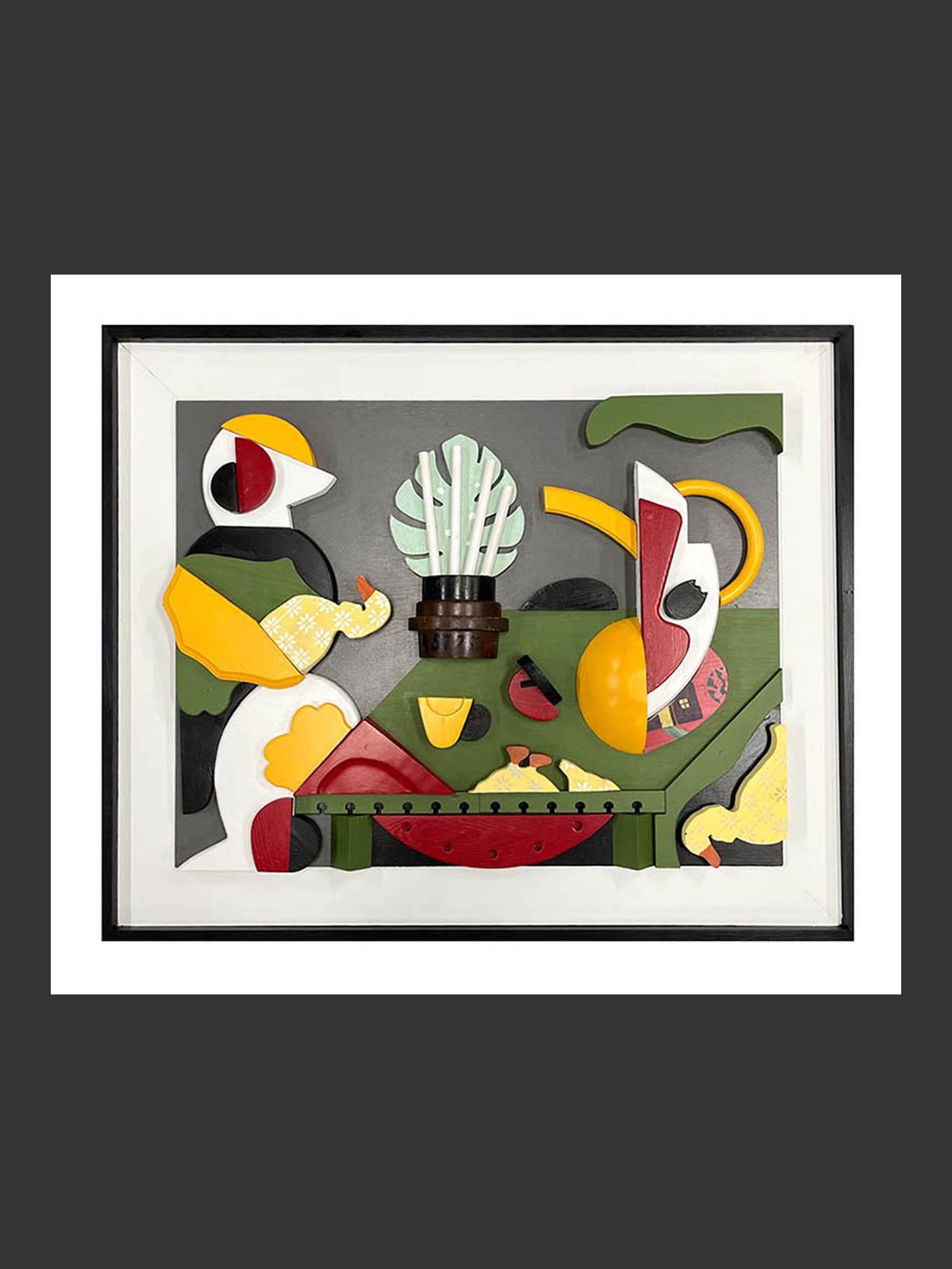 A modern art piece inspired by a piece by Romare Bearden made of repurposed wood featuring an abstract interpretation of two people dining at a table with bold yellow, green, and red colors and botanical elements arranged in a playful composition as an hommage to the late artist by David Furman.