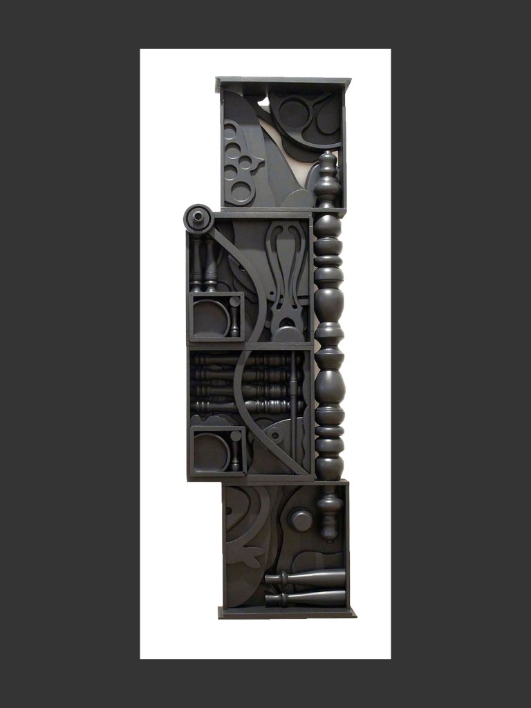 An intricate wall sculpture of abstract shapes made from reclaimed wood arranged within a rectangular box by David Furman.